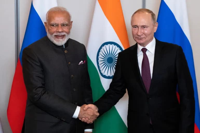 Poutine s'entretient informellement avec le Premier ministre indien Modi